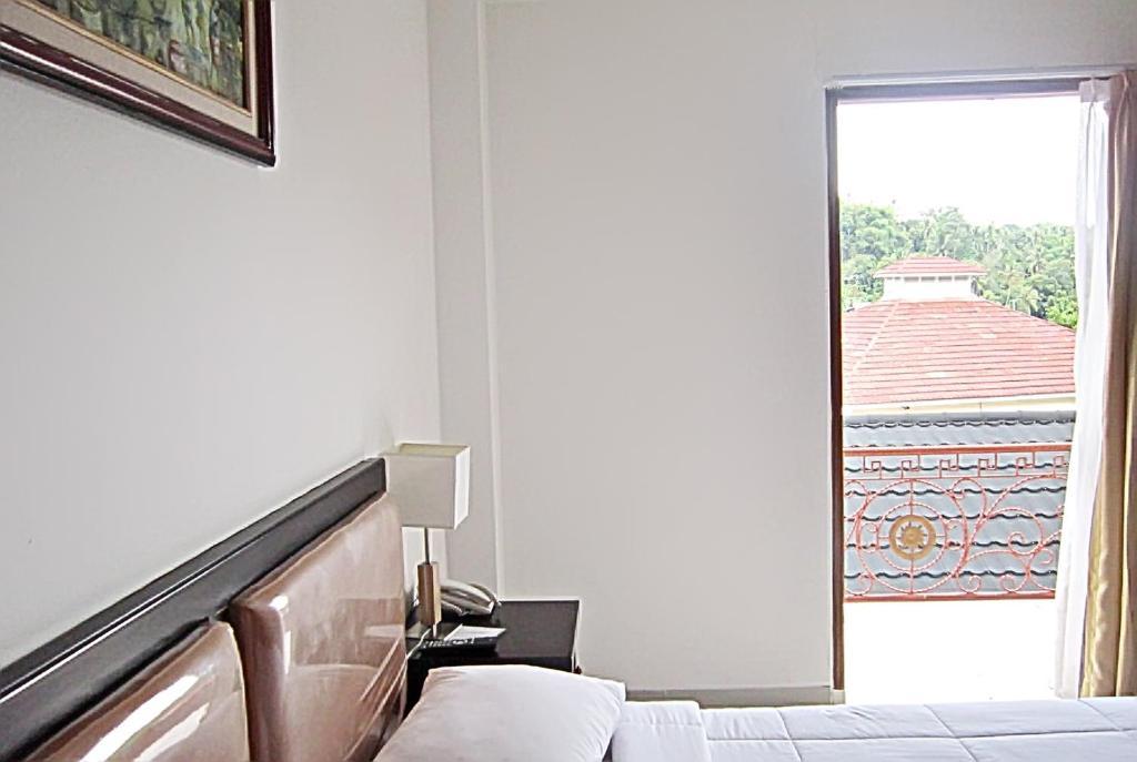 Parai City Garden Hotel - Sawahlunto Pokoj fotografie